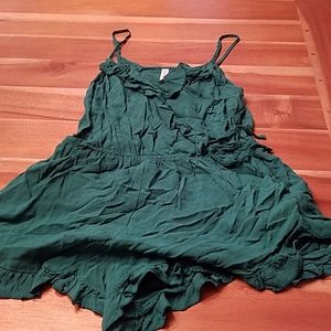 Green romper with pockets